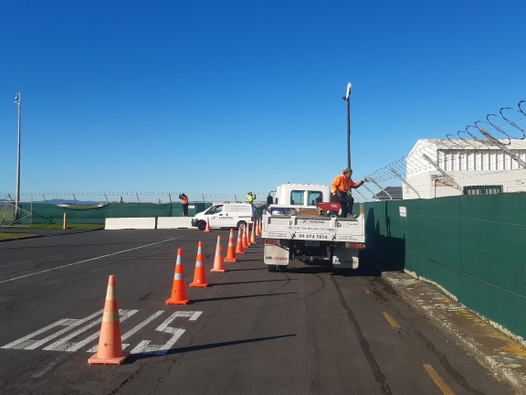 Razor wire added to existing security fence